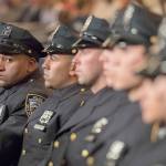 New police in New York City listen to speakers during their graduation Thursday. (AP Photo/Mary Altaffer)