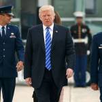 President Donald Trump walks to board Air Force One for a trip to Poland and Germany on Wednesday at Andrews Air Force Base, Maryland. (AP Photo/Evan Vucci)