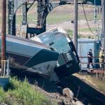 Emergency crews respond to the scene of a train derailment near Steilacoom on Sunday. Minor injuries were reported. (Joshua Bessex / The News Tribune)