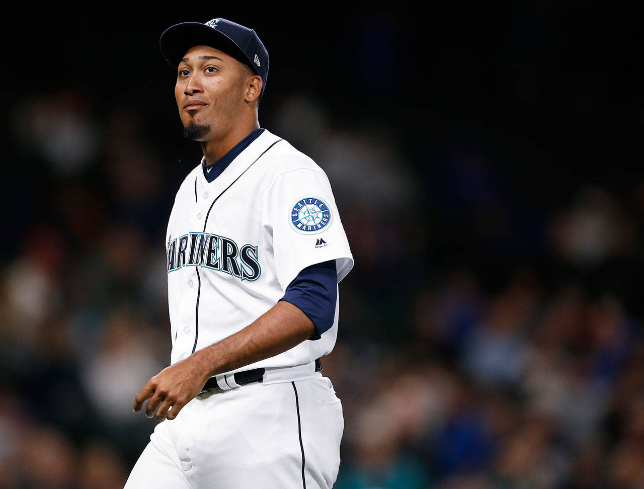 Mariners pitcher Edwin Diaz walks off the field after the ninth inning of a game against the Tigers on June 20, 2017, in Seattle. (AP Photo/Lindsey Wasson)