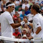 Switzerland&rsquo;s Roger Federer (left) shakes hands with Ukraine&rsquo;s Alexandr Dolgopolov after Dolgopolov retired from the match due to injury at the Wimbledon Tennis Championships on July 4, 2017, in London. (AP Photo/Alastair Grant)