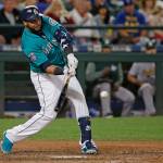 The Mariners&rsquo; Nelson Cruz hits a three-run home run during the eighth inning of a game against the Athletics on July 7, 2017, in Seattle. (AP Photo/Ted S. Warren)