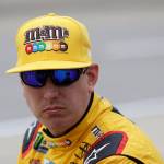 Kyle Busch waits before Cup Series qualifying on June 16, 2017, in Brooklyn, Mich. (AP Photo/Carlos Osorio)