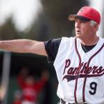Snohomish baseball coach Kim Hammons directs the Panthers in a Wesco 3A North game against Marysville Pilchuck at Earl Torgeson Field in Snohomish on May 10. Hammons is retiring after 25 years leading the Panther program. (Kevin Clark / The Herald)