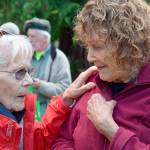 Irene Christofferson, 96, challenges her younger friend, Meg Noble Peterson, 89, to catch up with her at Peterson&rsquo;s recent birthday celebration. (Patricia Guthrie/Whidbey News-Times)