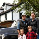 Blair and Kathy Corson and their children, William, 6, and Amelia, 4, outside the Bush House with their vintage 1952 Chevrolet pickup truck Tuesday (Dan Bates / The Herald)