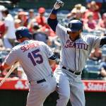 Seattle Mariners&rsquo; Robinson Cano, right, celebrates with Kyle Seager after his three-run home run during the eighth inning against the Los Angeles Angels in Anaheim, Calif., Sunday, July 2. (AP Photo/Chris Carlson)