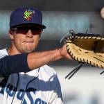 AquaSox first baseman Evan White plays catch before a game against Canadians on June 27, 2017, at Everett Memorial Stadium in Everett. (Kevin Clark / The Herald)