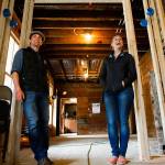 With light hearts and easy smiles, Blair and Kathy Corson appear to handle the many difficulties of reconstructing a 118-year-old hotel. (Dan Bates / The Herald)