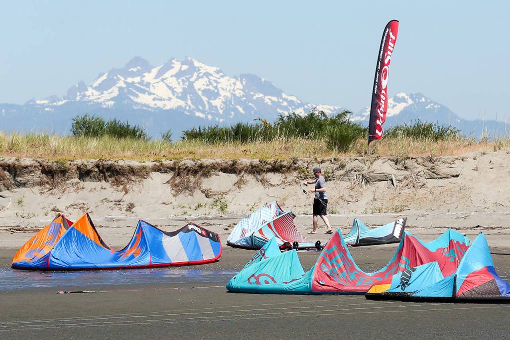 Kites rest on the beach during the Jetty Island Light Wind Olympics 2017. (Kevin Clark / The Herald)