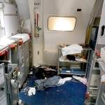 The aftermath in the cabin of Delta Flight 129 from Seattle to Beijing, after authorities say flight attendants struggled with Joseph Daniel Hudek IV, a passenger who lunged for an exit door. The photo was included in a criminal complaint filed Friday. (FBI via U.S. Attorney&rsquo;s Office in Seattle via AP)