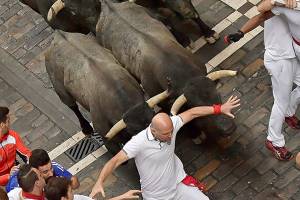 American gored at the running of bulls vows to run again