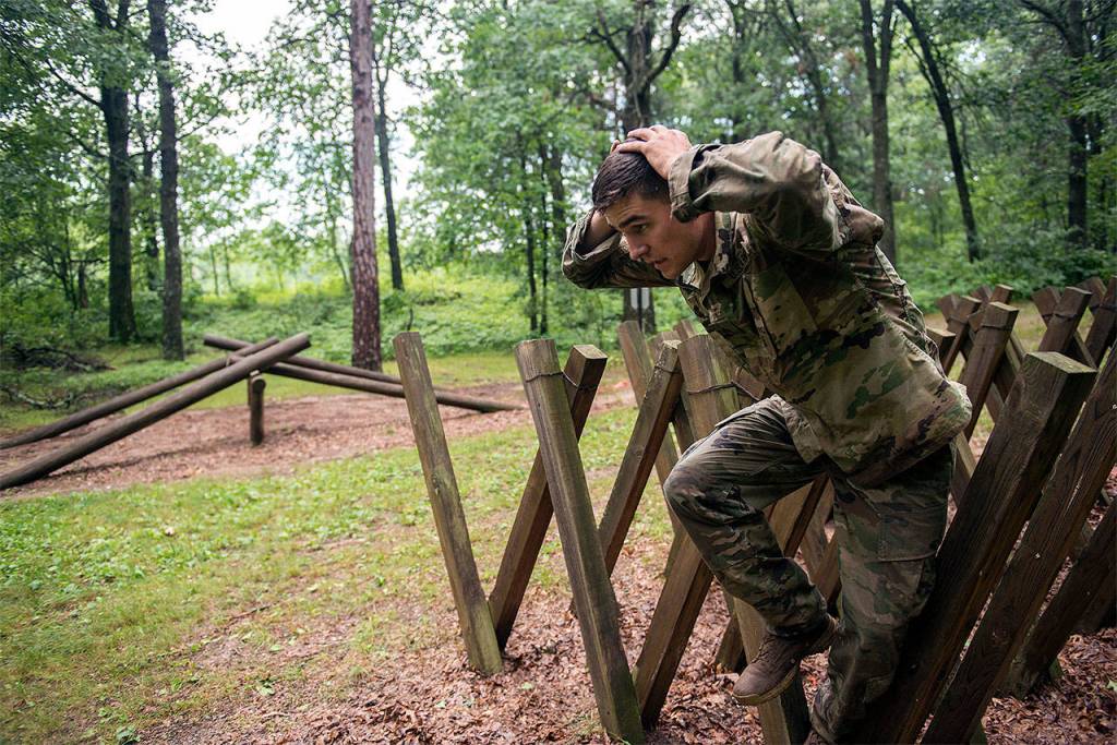 Sgt. Grant Reimers, a heavy vehicle driver with 1859th Light-Medium Transportation Company, Nevada National Guard, moves through an obstacle on the confidence course during the 2017 Army National Guard Best Warrior Competition on July 18 at Camp Ripley, Minnesota. This was the fifth event of the day the competitors completed on the second day of the competition. (Minnesota National Guard / Sgt. Sebastian Nemec)