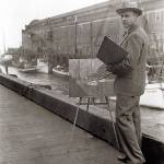 In this photograph from 1924 by Ella E. McBride, Paul Morgan Gustin paints along the Seattle waterfront. An exhibit of his works is the current featured show at Cascadia Art Museum in Edmonds.