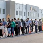 Amazon, in sign of growth, holds job fair for US warehouses