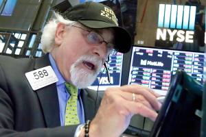 Apple takes Dow over 22,000 points; other stocks fall