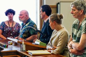 Looking straight at Superior Court Judge David Kurtz, Gary Bean (second from left), the angry father of murder victim Shannon Yeager, tells the judge he wants death for the convicted murderer, John Derosia (right). From left are victim advocate Kameon Quillen, Bean, deputy prosecutor Adam Cornell, court-appointed attorney Jennifer Bartlett and Derosia. (Dan Bates / The Herald)