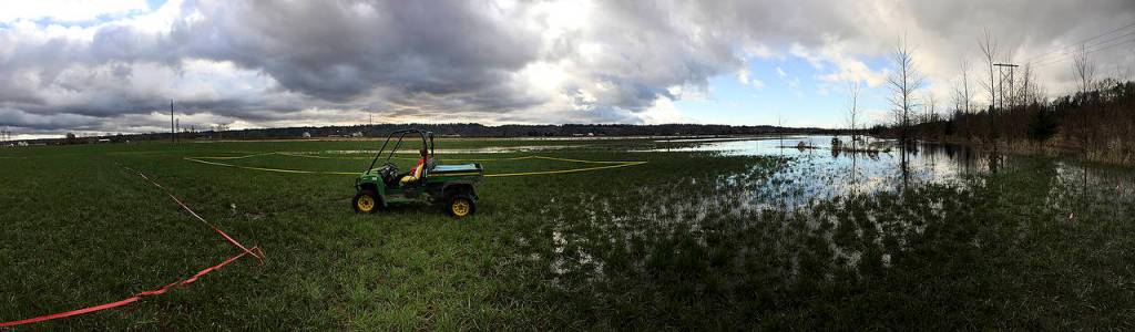&ldquo;In drier years, farming a few feet above sea level is always a bit of a gamble. Yet as the clouds build and the winter rain falls, I wonder if it is a matter of climate change or all the development (and its consequential gutters, pavement, and sewer lines) that encircle the valley. Are we building an agricultural legacy, or an urban drain field?&rdquo; &mdash; photographer Nichlos Pate. (Courtesy of Nichlos Pate / Raising Cane Ranch)