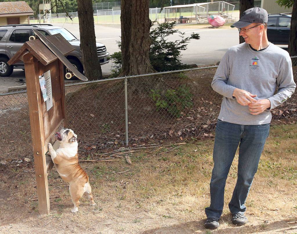 Marcus Singel laughs at Strawberry Hill Park. (Meegan M. Reid / Kitsap Sun)
