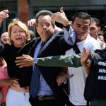 Venezuelan General Prosecutor Luisa Ortega Diaz is surrounded by loyal employees of the General Prosecutor&rsquo;s office, as she was barred from entering by security forces outside of the General Prosecutor headquarters in Caracas, Venezuela, on Saturday. (AP Photo/Wil Riera)