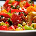 Tomatoes with capers, almonds and herbs offer a no-fuss delight with big flavors. (Photo by Deb Lindsey for The Washington Post)