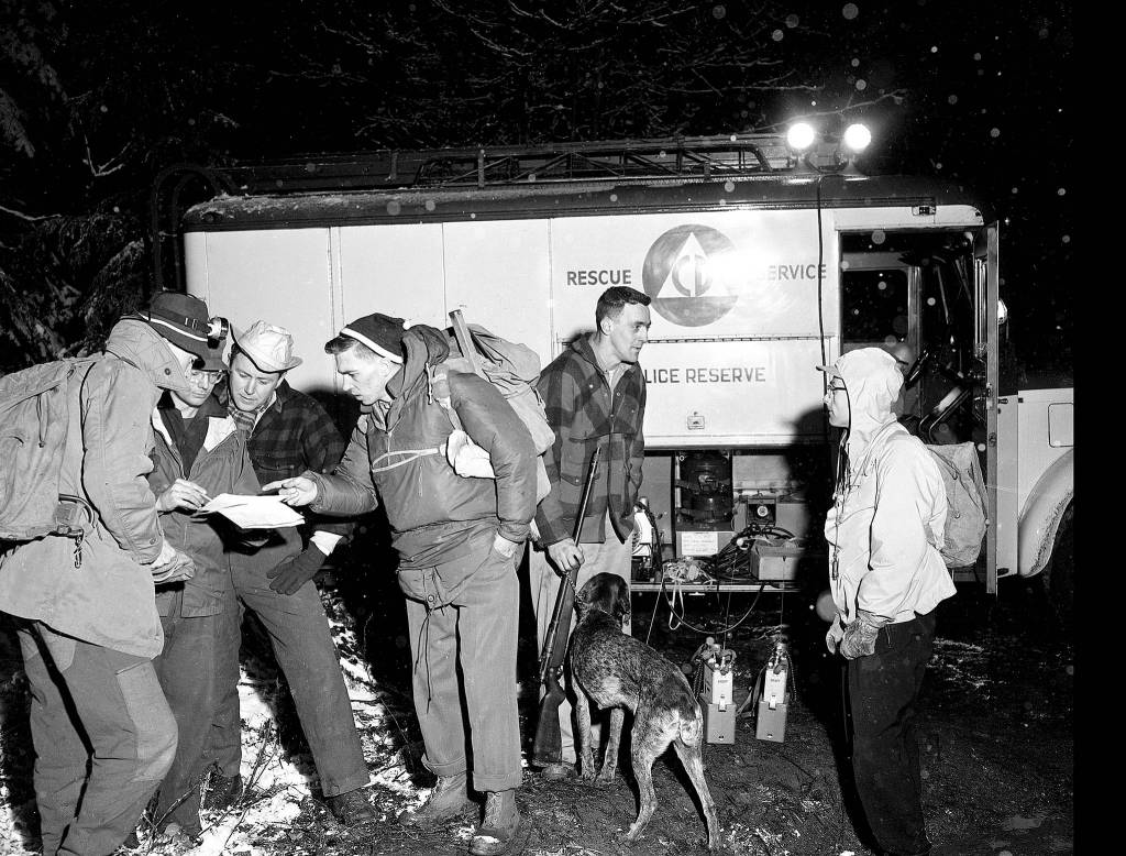 A predecessor of the Search and Rescue team prepares to search for a missing boy in the Lake Bosworth area in 1959. (Photo by Jim Leo, Herald photographer)