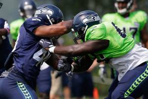Wilson, Thomas star in Seahawks’ first camp scrimmage