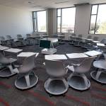 This active learning classroom with wheeled chairs and a four-panel video monitor at Washington State University in Everett is meant to break the traditional &ldquo;sage on a stage&rdquo; classroom dynamic. It&rsquo;s one of 14 classrooms that&rsquo;s opening this month at WSU&rsquo;s new campus in Everett. (Andy Bronson / The Herald)