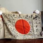 WWII vet brings fallen enemy’s flag on a long journey home