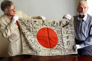 WWII vet brings fallen enemy’s flag on a long journey home