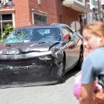 A vehicle reverses after driving into a group of protesters demonstrating against a white nationalist rally in Charlottesville, Virginia, on Saturday. (Ryan M. Kelly/The Daily Progress via AP)
