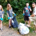 Volunteers pick up beach trash