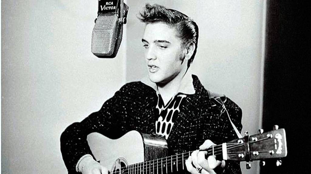 Elvis Presley, shown in recording studio in 1955, died 40 years ago this week. He is regarded as one of the most significant cultural icons of the 20th century. (Popsie Randolph)
