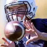 Meadowdale senior Will Schafer makes a catch during practice Aug. 17, 2017, at Meadowdale High School in Lynnwood. (Kevin Clark / The Herald)