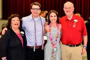 Don and Jan Jensen (far right and far left) with Sara Thomas and Zack Demars, both 2017 Cascade High School graduates and winners of scholarships awarded in honor of the Jensens&rsquo; son Brett, who died in 2002.