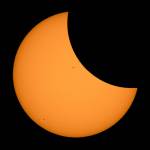 The moon passes in front of the sun during the solar eclipse near Ross Lake in North Cascades National Park on Monday. (Bill Ingalls/NASA via AP)