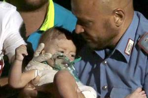Italian boy credited with helping save brother after quake
