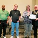 Victoria Mason (second from right) from Catholic Community Services presents a Certificate of Appreciation on behalf of Sebastian Place to Everett Elks Lodge 479 Exalted Ruler Dennis Andersen. Also pictured are (from left) Ken Berry and Gerry Olsen. (Contributed photo)
