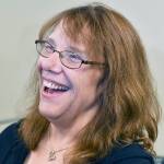 Mavis Wanczyk, of Chicopee, Massachusetts, smiles during a news conference where she claimed the $758.7 million Powerball prize at Massachusetts State Lottery headquarters on Thursday. (AP Photo/Josh Reynolds)