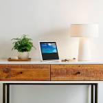 An Amazon Echo Show is seen on display in a living room setting. With Echo Show, Amazon has given its voice-enabled Echo speaker a touch screen and video-calling capabilities. (Amazon)