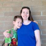 Laura Millikan works two part-time jobs outside Seattle, while studying for an associate degree and raising her son. Despite working hard, she earns only $25,000 a year. (Family photo)