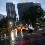 A damaged stop light blocks a street as Hurricane Harvey makes landfall in Corpus Christi, Texas, on Friday. (Nick Wagner/Austin American-Statesman via AP)