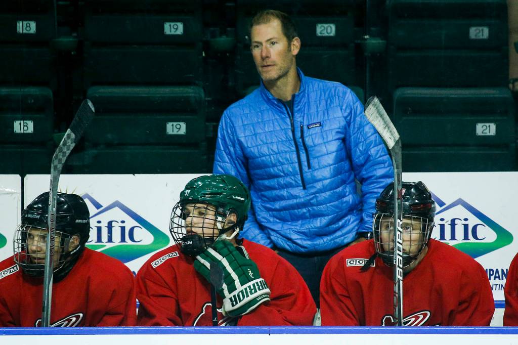 Former NHL player Brendan Morrison helps coach the Everett Silvertips red training squad during the second day of the team&rsquo;s training camp at Xfinity Arena on Aug. 25, 2017. (Ian Terry / The Herald)