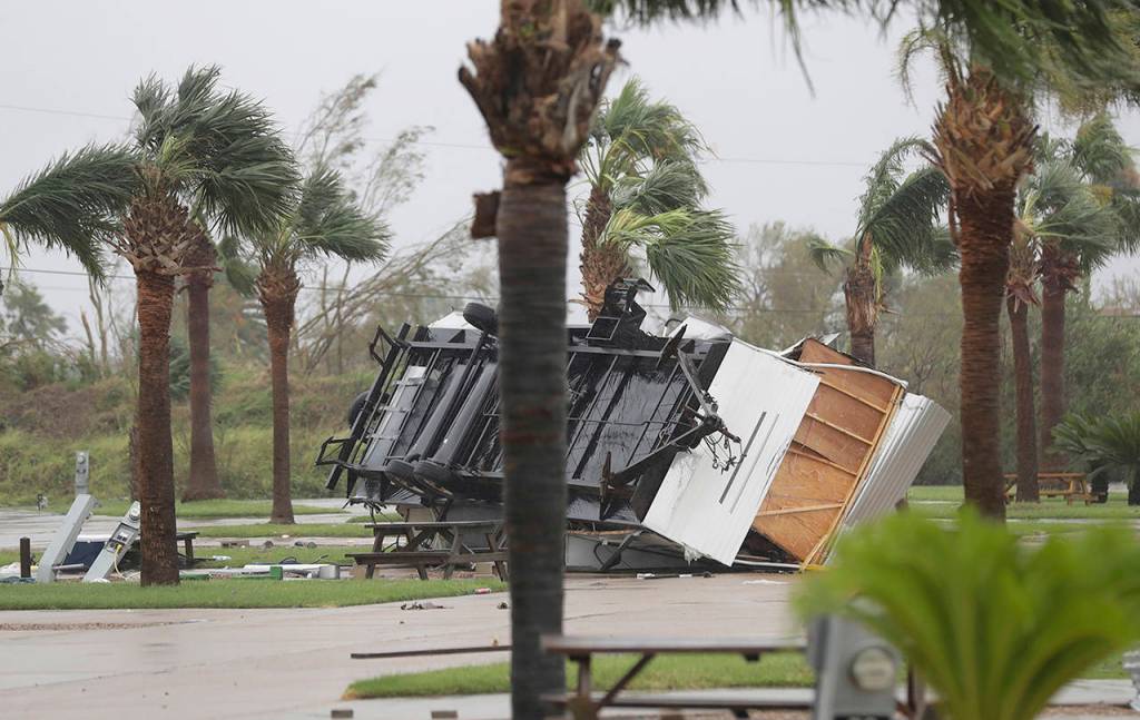 An overturned trailer sits in a park in the wake of Hurricane Harvey on Saturday in Aransas Pass, Texas. (AP Photo/Eric Gay)