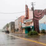 A single truck drives down a street as Hurricane Harvey makes landfall in downtown Port Lavaca, Texas on Friday. (Ana Ramirez/The Victoria Advocate via AP)