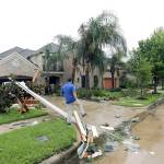 A contractor walks over debris from Hurricane Harvey on Saturday in Missouri City, Texas. (AP Photo/David J. Phillip)