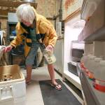Carolyn Price empties a fridge on the lower level of her property in Matagorda, Texas before Hurricane Harvey makes landfall Friday. (Godofredo A. Vasquez/Houston Chronicle via AP)