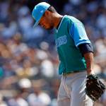 Seattle&rsquo;s Yovani Gallardo reacts during the second inning of Saturday&rsquo;s game in New York. (AP Photo/Adam Hunger)