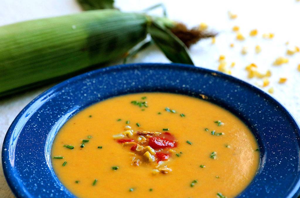 This grilled white corn soup with leeks and roasted peppers is just as good served chilled as it is hot. (Christian Gooden / St. Louis Post-Dispatch)