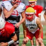 Snohomish&rsquo;s Keegan Stich (far right) awaits the snap during practice Monday afternoon at Snohomish High School. Stich and the Panthers are hoping to return to the postseason in 2017. (Kevin Clark / The Herald)